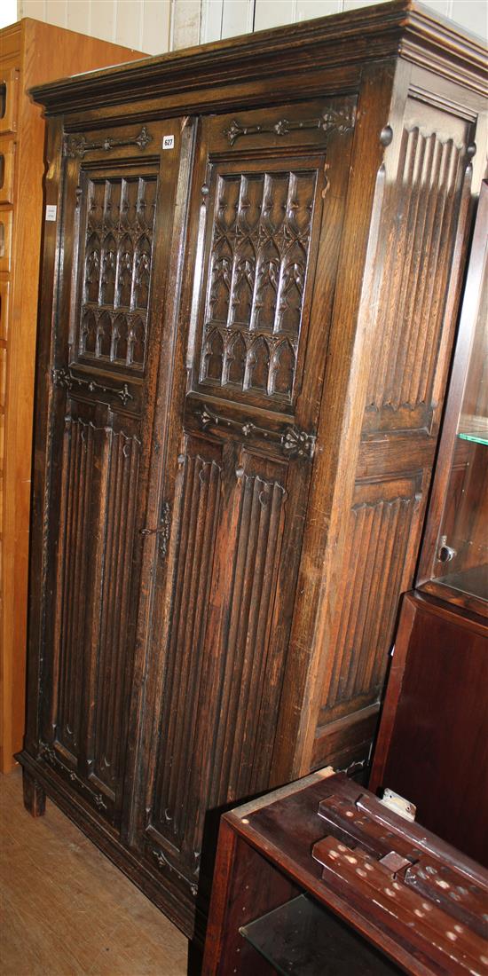 Gothic style carved oak two door hanging wardrobe